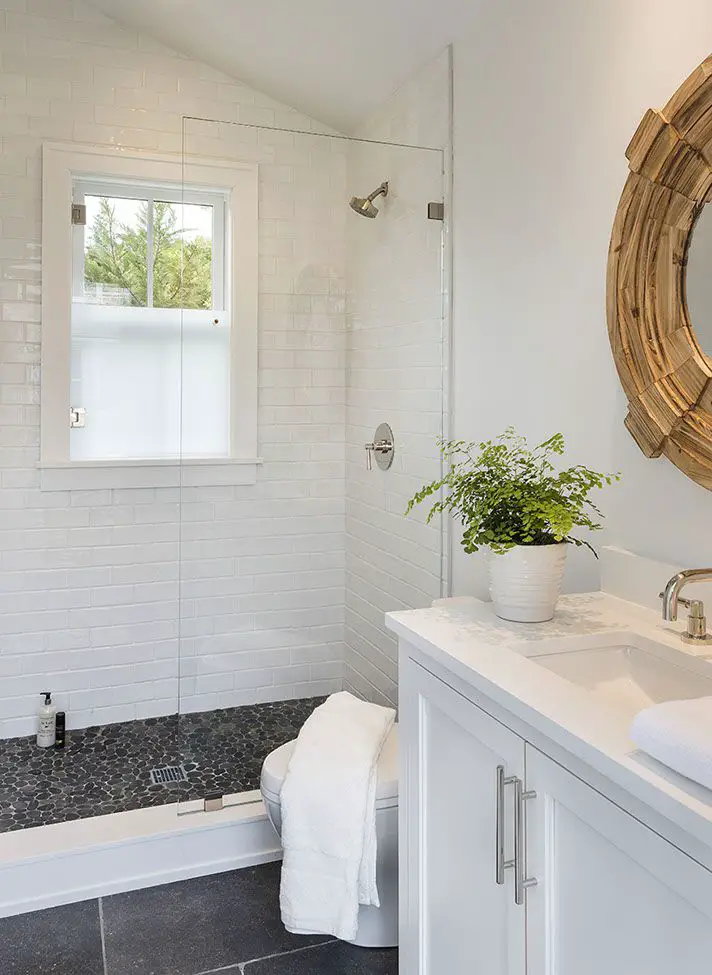 Small White Bathroom With Pebble Tile