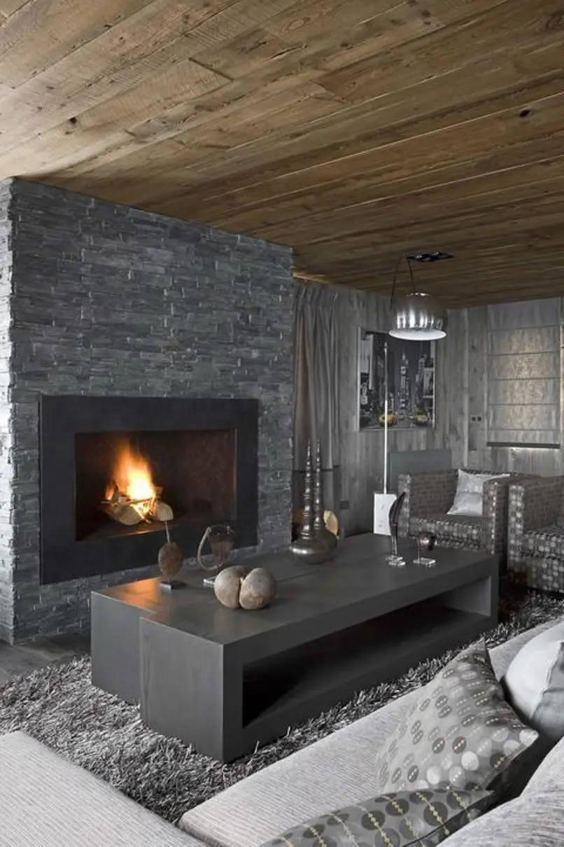 Masculine Living Room With A Stone Clad Fireplace